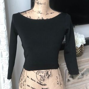 Stretchy black crop top with back cut out